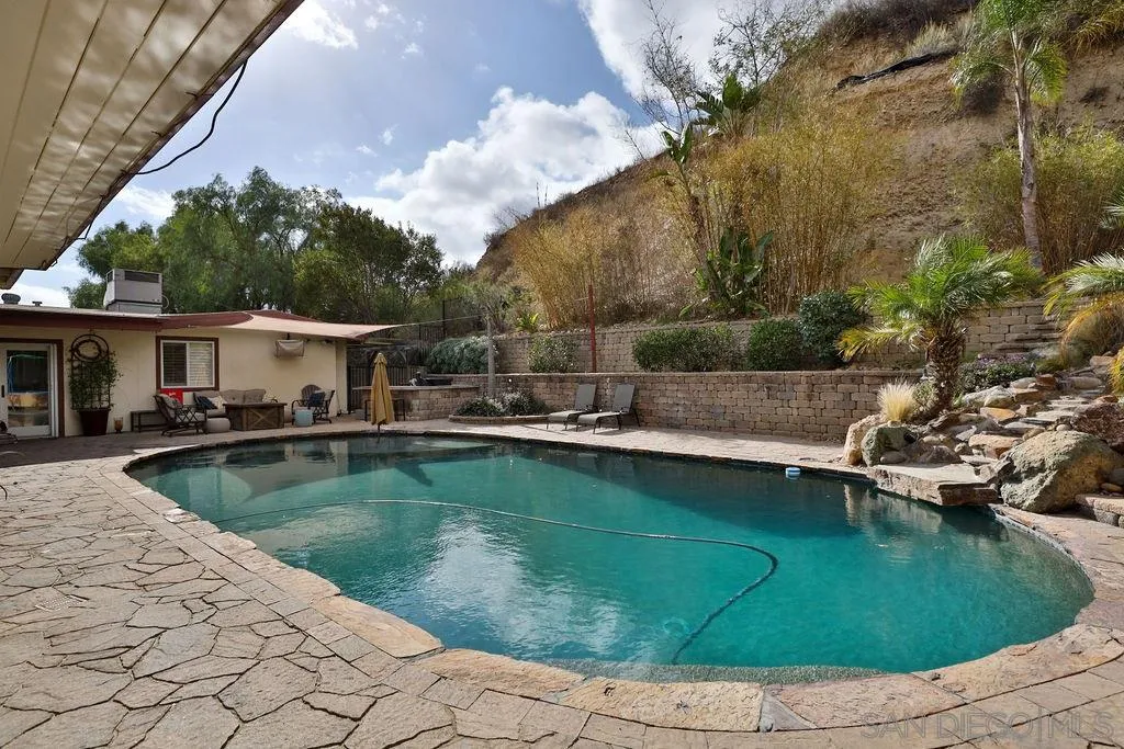 11836 Rocoso Road Lakeside, CA 92040 - Photo 48 of 65 a view of a house with swimming pool