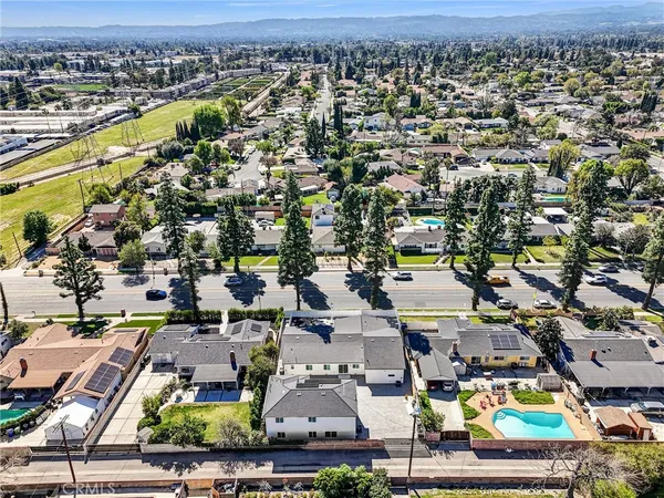an aerial view of a city with lots of residential buildings