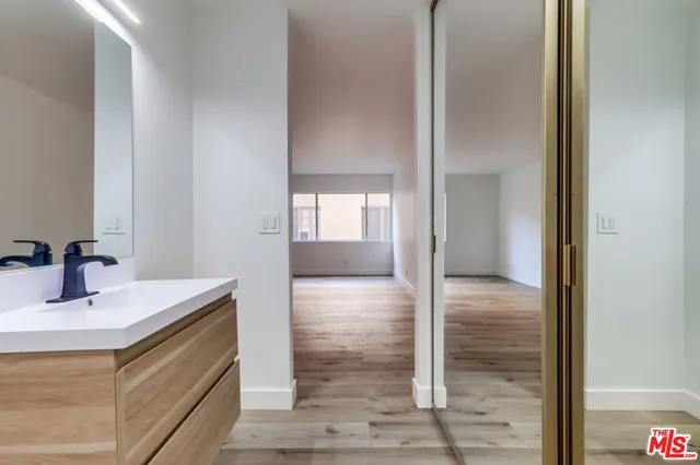 a bathroom with a sink and a bathtub