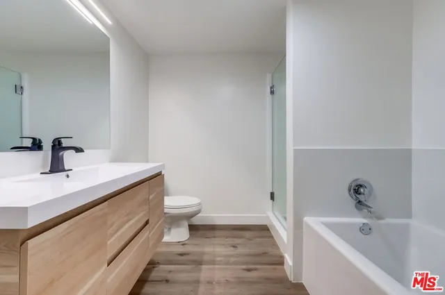 a white bath tub sitting in a bathroom