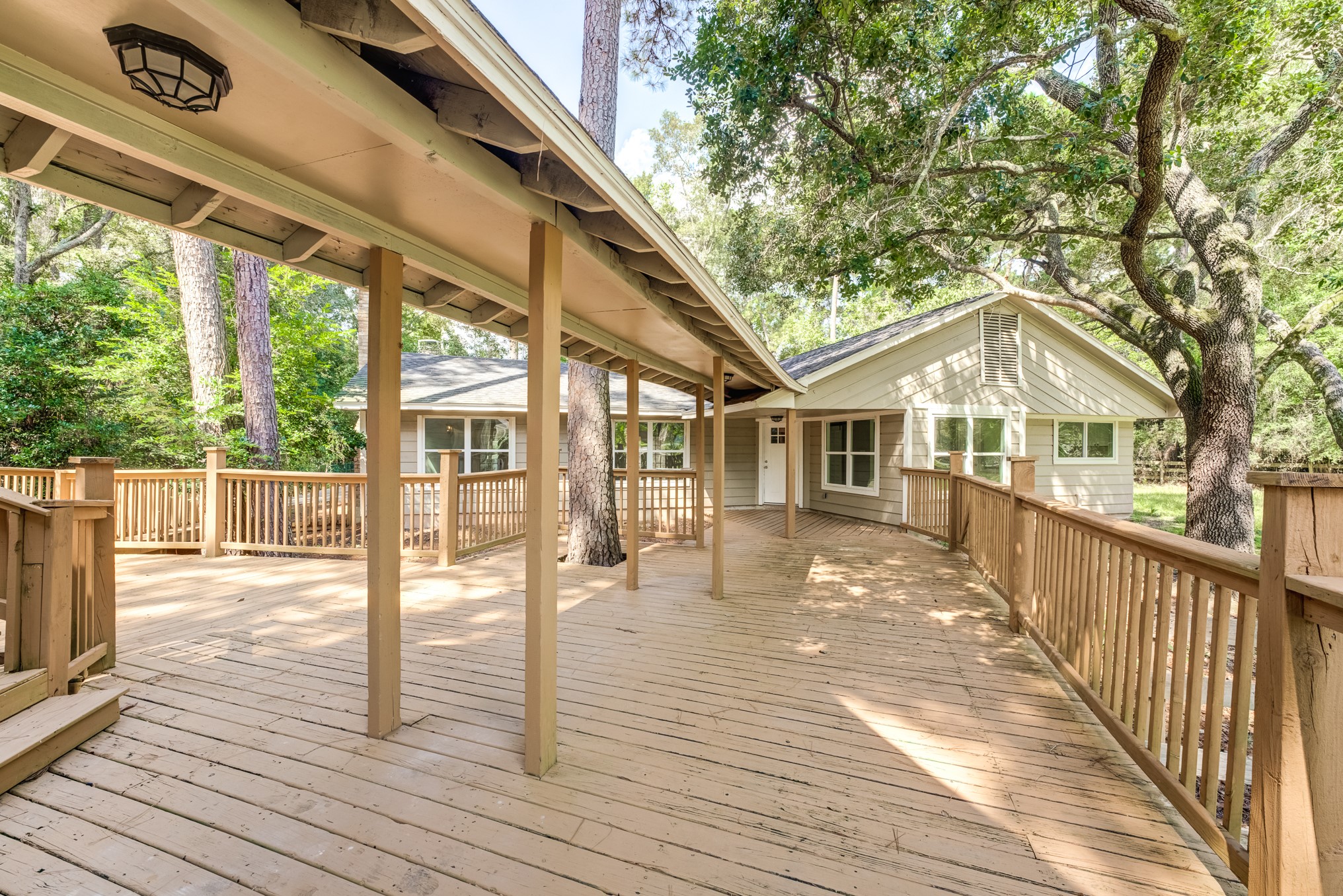 81 Oak Grove Lane Conroe, TX 77304 - Photo 41 of 50 a front view of a house with a porch
