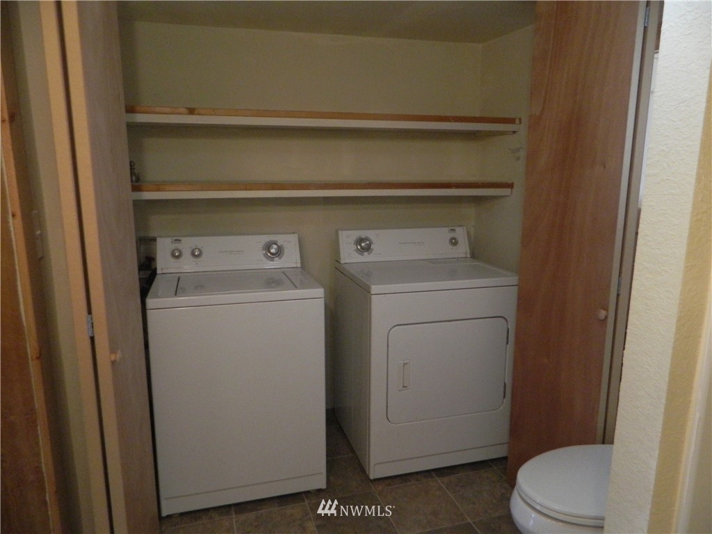 103 Cooper Street Riverside, WA 98849 - Photo 9 of 12 a utility room with dryer and washer