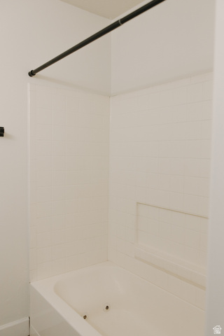 215 South 1050th West, Unit 10 Provo, UT 84601 - Photo 12 of 38 Bathroom with bathtub / shower combination and baseboards