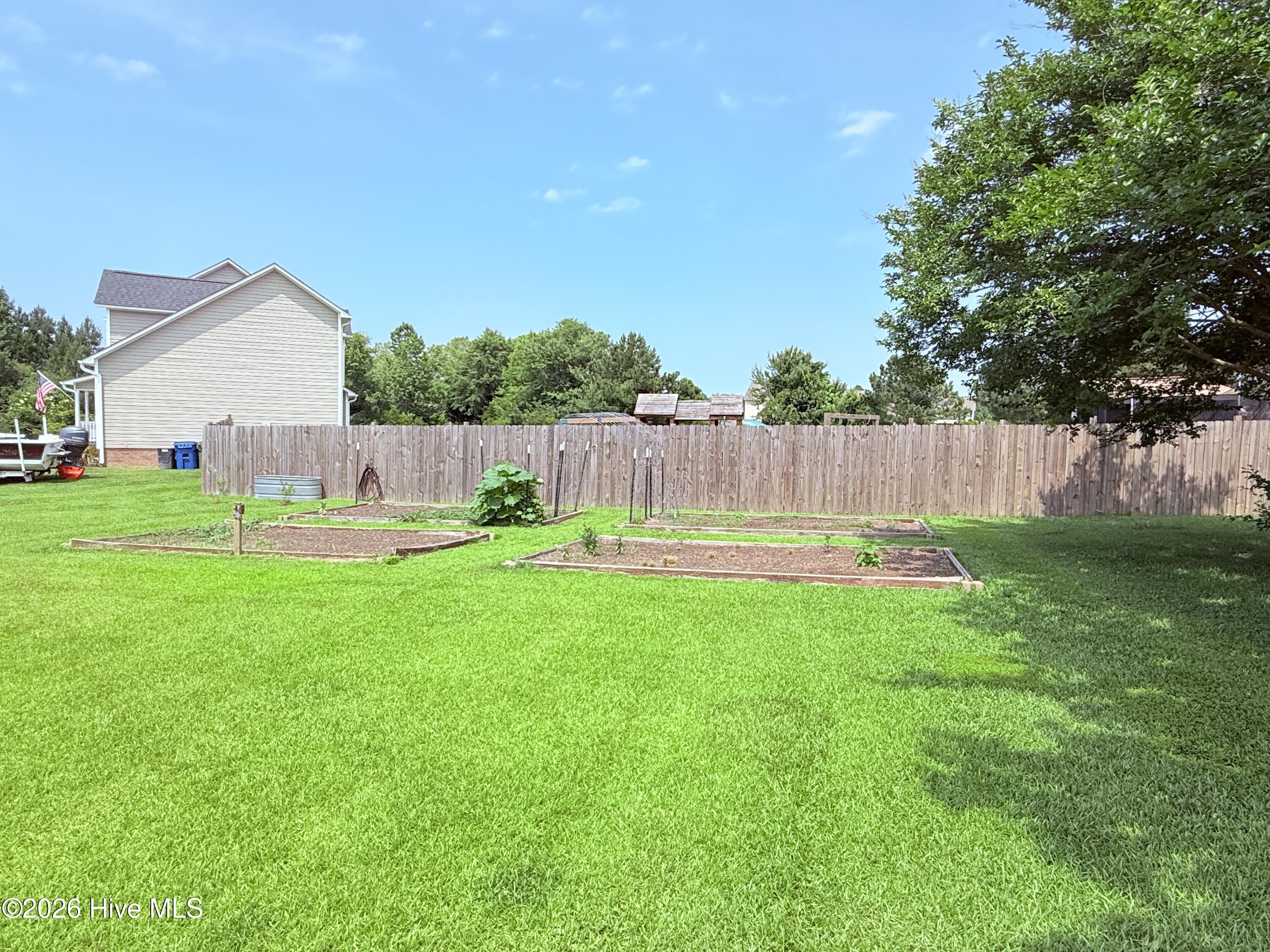 188 East Ridge Court Jacksonville, NC 28540 - Photo 25 of 29 Side Yard garden