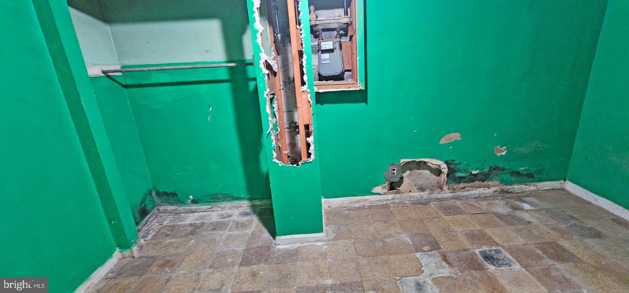 8517 Oglethorpe Street Hyattsville, MD 20784 - Photo 12 of 15 a green field with trees in front of it