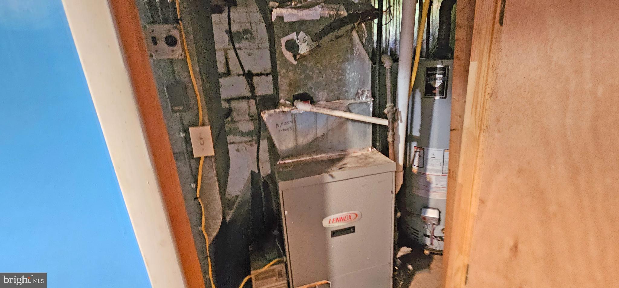 8517 Oglethorpe Street Hyattsville, MD 20784 - Photo 13 of 15 a view of walk in closet with wooden floor