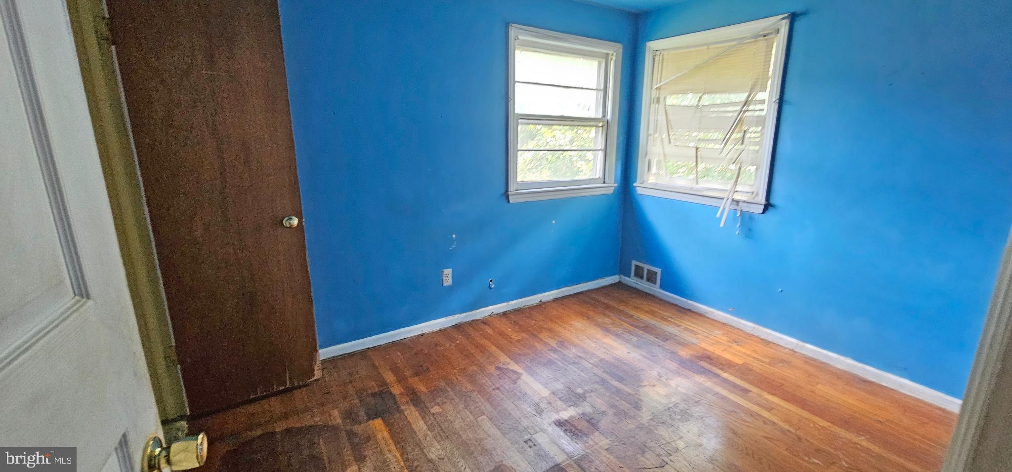 8517 Oglethorpe Street Hyattsville, MD 20784 - Photo 5 of 15 a view of empty room with window