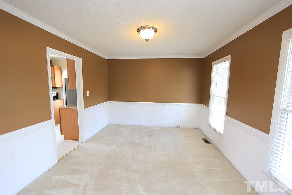 3221 Leebrook Road Raleigh, NC 27616 - Photo 2 of 12 a view of an empty room with a window