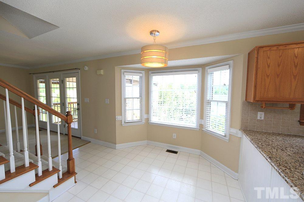 3221 Leebrook Road Raleigh, NC 27616 - Photo 6 of 12 a view of an empty room with a window