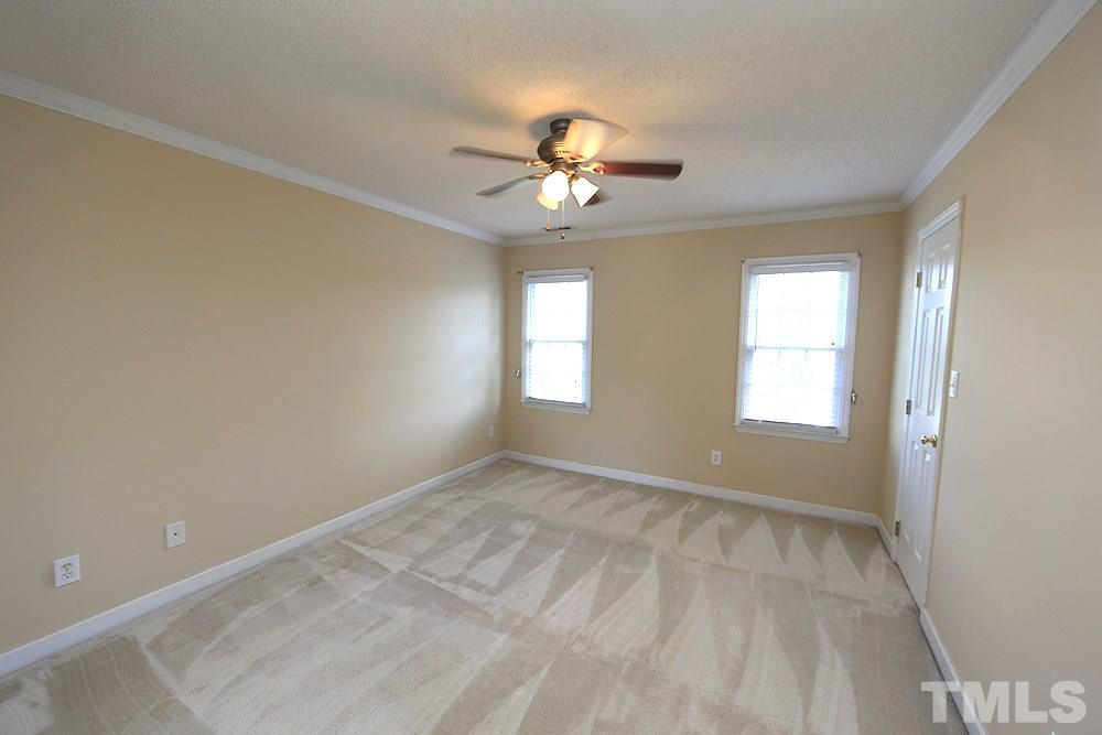 3221 Leebrook Road Raleigh, NC 27616 - Photo 7 of 12 a view of an empty room with a window