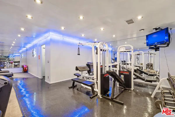a view of a room with gym equipment