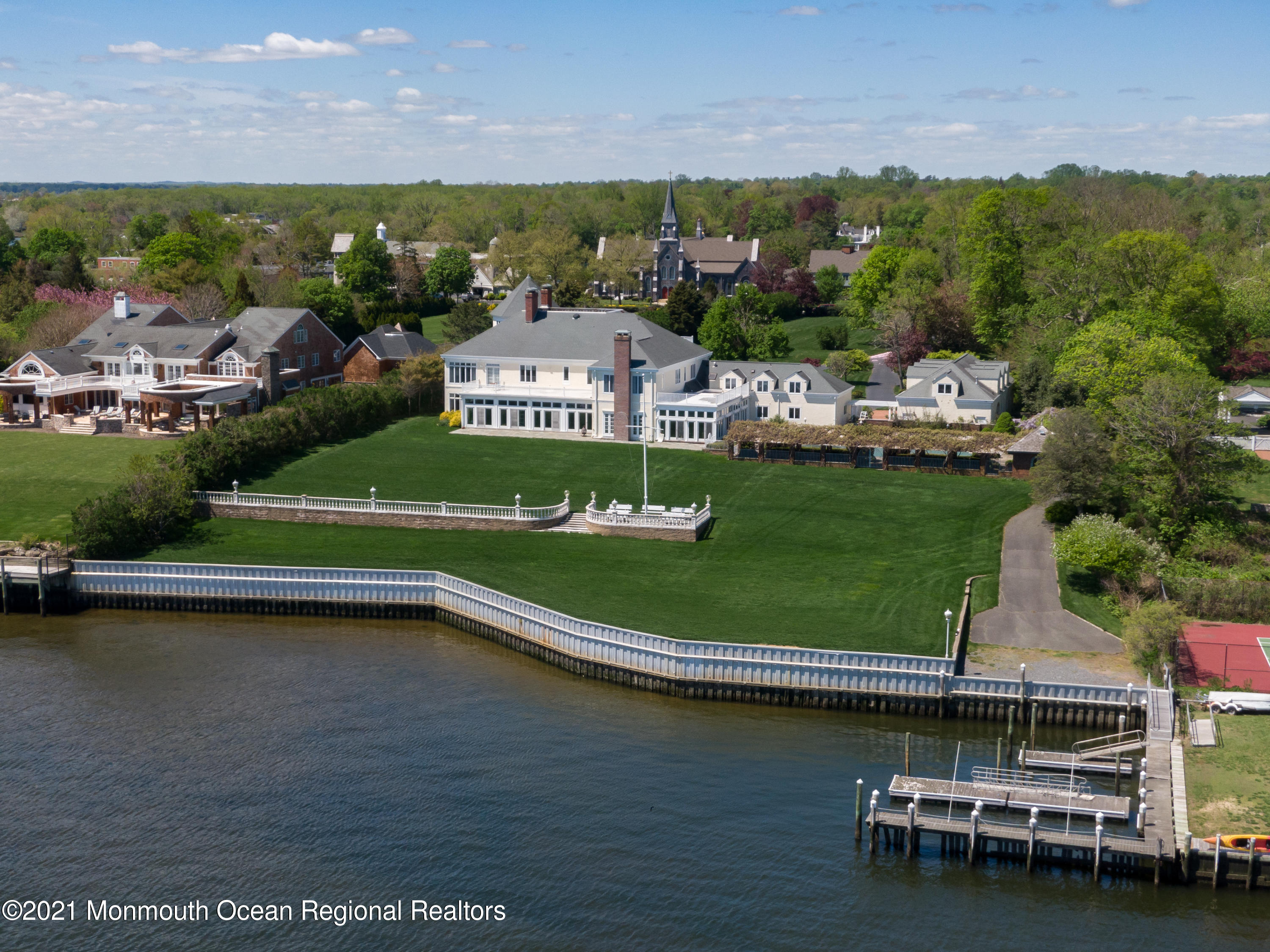 29 Ward Avenue Rumson, NJ 07760 - Photo 6 of 25 an aerial view of a house with a garden and lake view