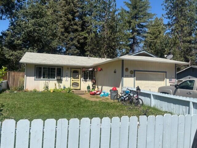 20158 Mapleleaf Street Burney, CA 96013 - Photo 1 of 33 a front view of house with a garden