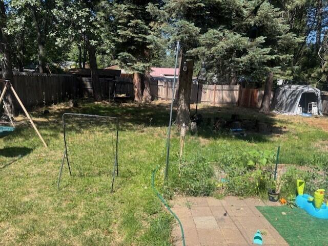 20158 Mapleleaf Street Burney, CA 96013 - Photo 27 of 33 a backyard of a house with lots of green space