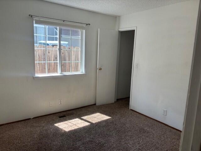 20158 Mapleleaf Street Burney, CA 96013 - Photo 7 of 33 an empty room with a window