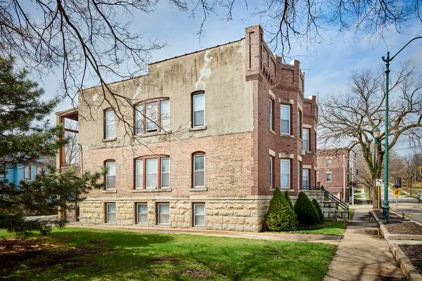 front view of a house with a yard