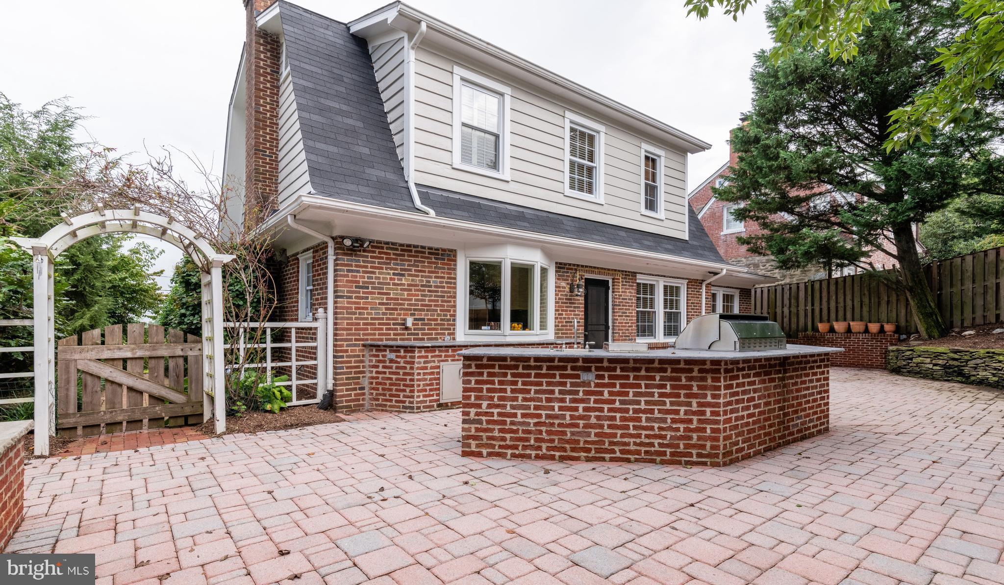 6036 Fort Hunt Road Alexandria, VA 22307 - Photo 41 of 52 Rear house and patio view