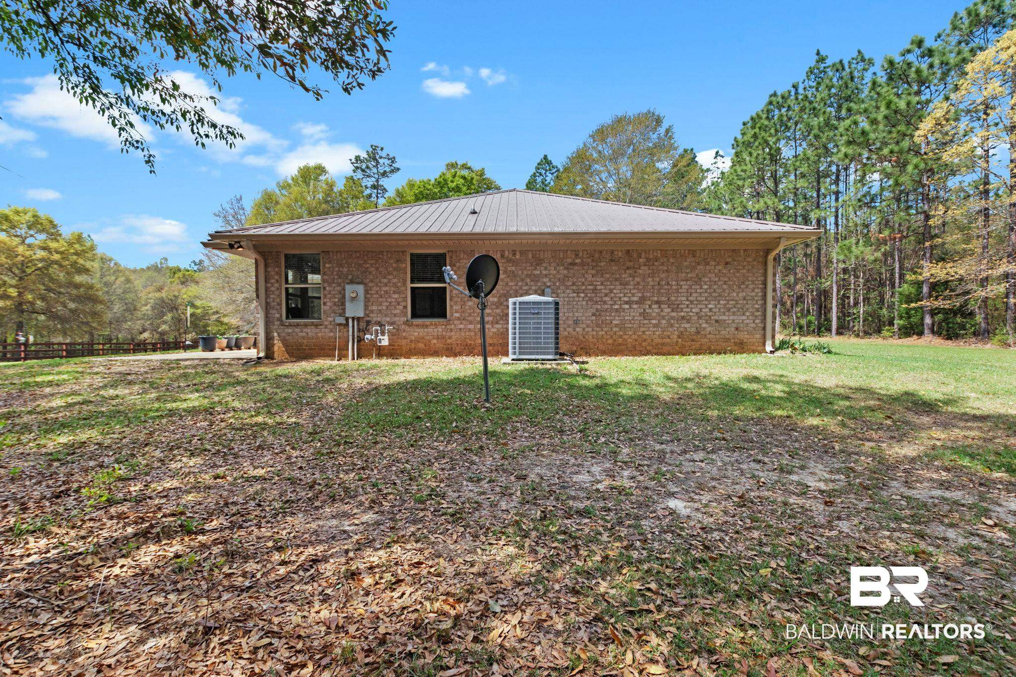 24250 Hack Road Bay Minette, AL 36507 - Photo 47 of 88 Back of property featuring a yard and brick siding