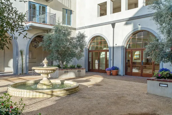 a view of a building with a swimming pool
