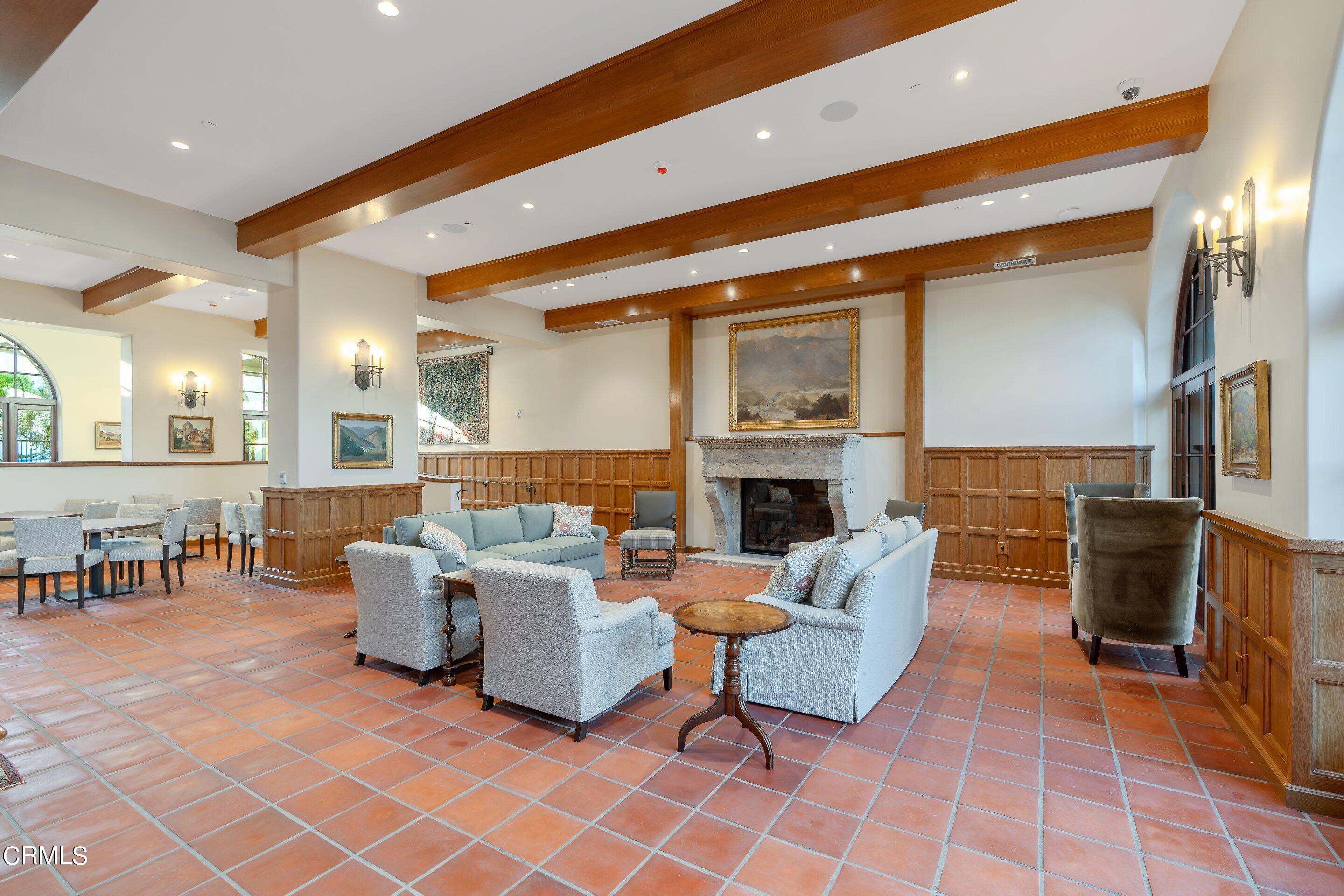 88 North Oakland Avenue, Unit 504 Pasadena, CA 91101 - Photo 17 of 46 a living room with furniture and a fireplace