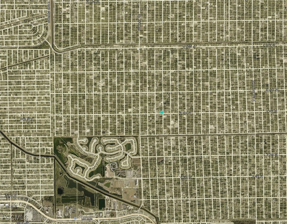 800 West 9th Street Lehigh Acres, FL 33972 - Photo 13 of 14 a bathroom with a shower