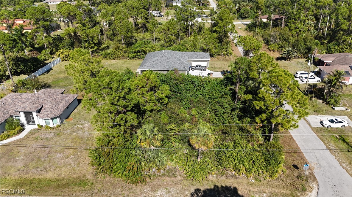 800 West 9th Street Lehigh Acres, FL 33972 - Photo 4 of 14 an aerial view of residential house with outdoor space