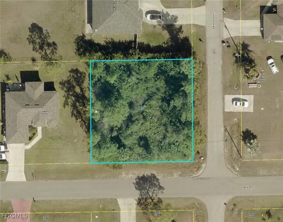 800 West 9th Street Lehigh Acres, FL 33972 - Photo 8 of 14 an aerial view of a residential houses with outdoor space