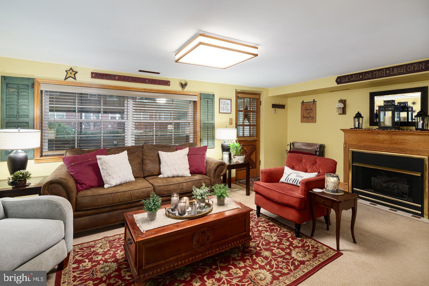 12482 Balston Road Philadelphia, PA 19154 - Photo 19 of 30 a living room with furniture fireplace and a large window