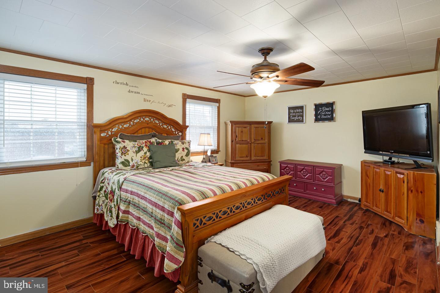 12482 Balston Road Philadelphia, PA 19154 - Photo 24 of 30 a bedroom with a bed and a flat screen tv