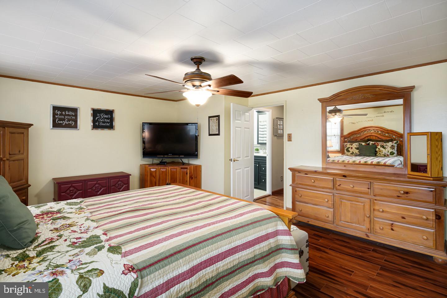 12482 Balston Road Philadelphia, PA 19154 - Photo 25 of 30 a bedroom with a bed and a flat screen tv