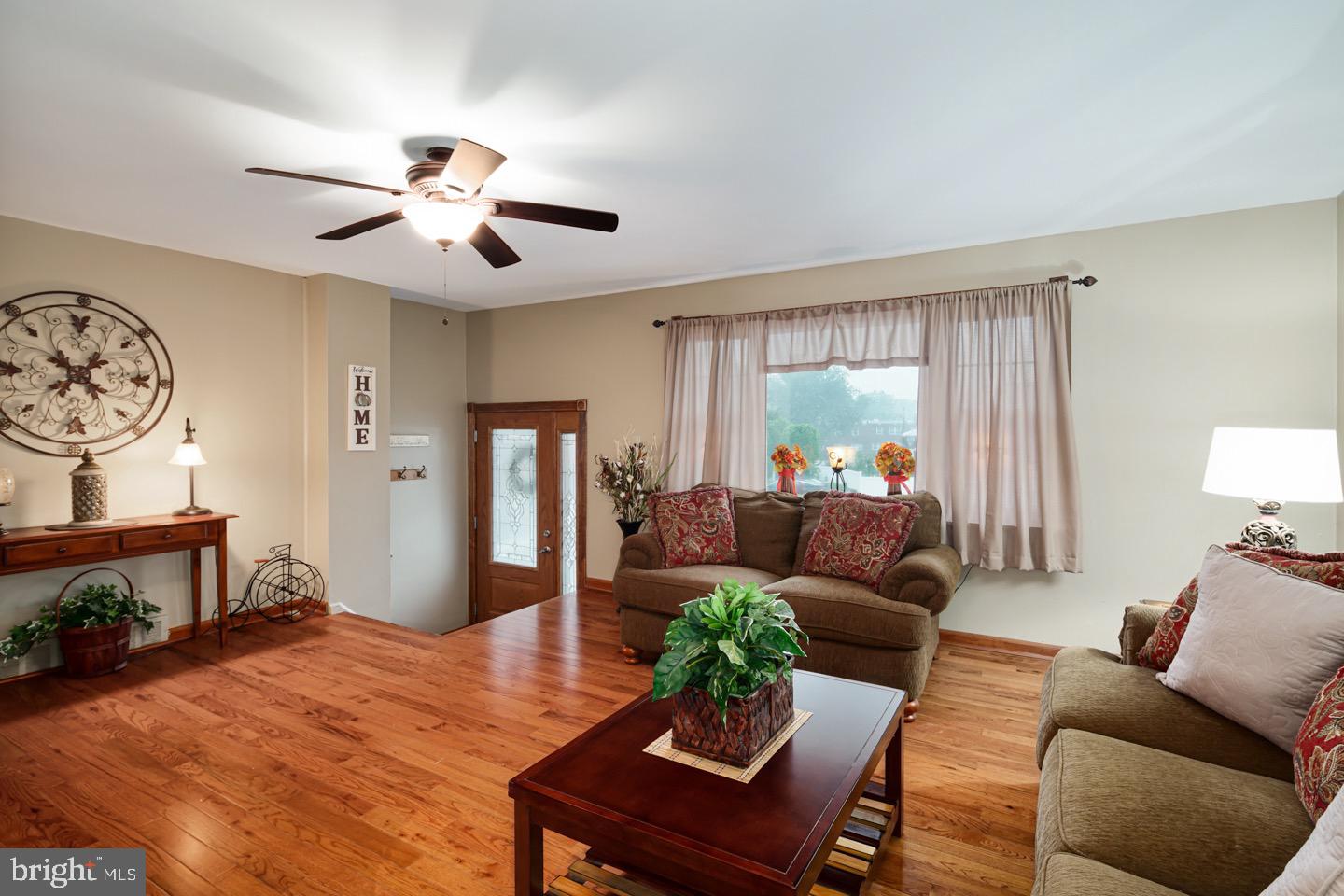12482 Balston Road Philadelphia, PA 19154 - Photo 8 of 30 a living room with furniture and a wooden floor