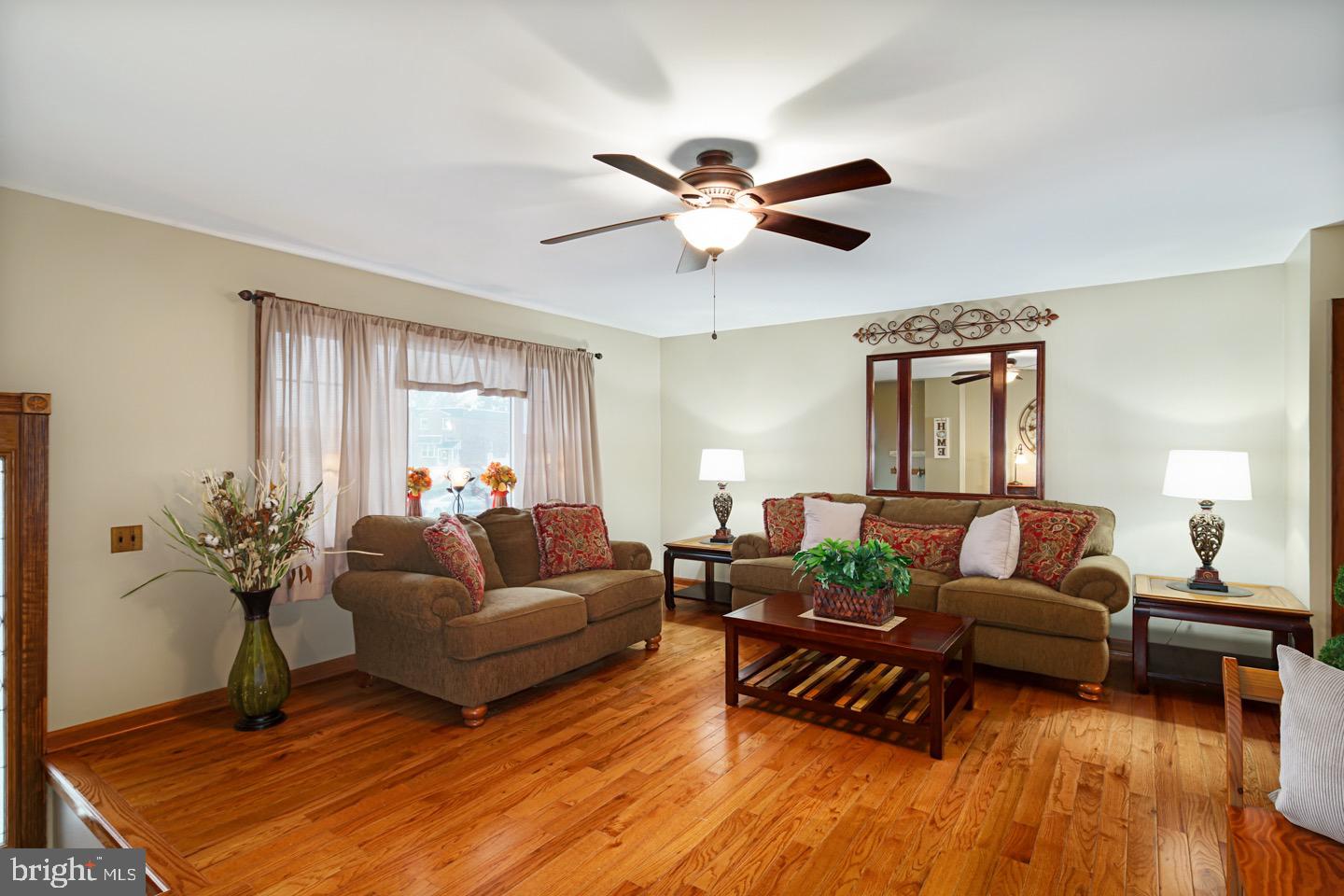 12482 Balston Road Philadelphia, PA 19154 - Photo 9 of 30 a living room with furniture and a large window