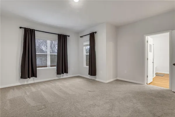 a view of an empty room with window