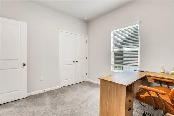 a view of livingroom with kitchen