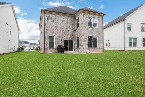 a front view of house with yard