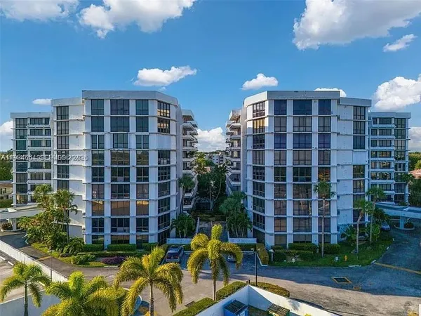 a view of a building with a garden