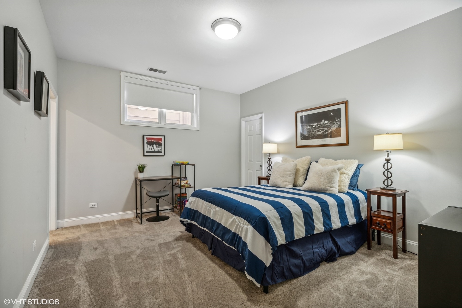 3818 North Clark Street, Unit 1S Chicago, IL 60613 - Photo 19 of 22 a spacious bedroom with a bed and a window