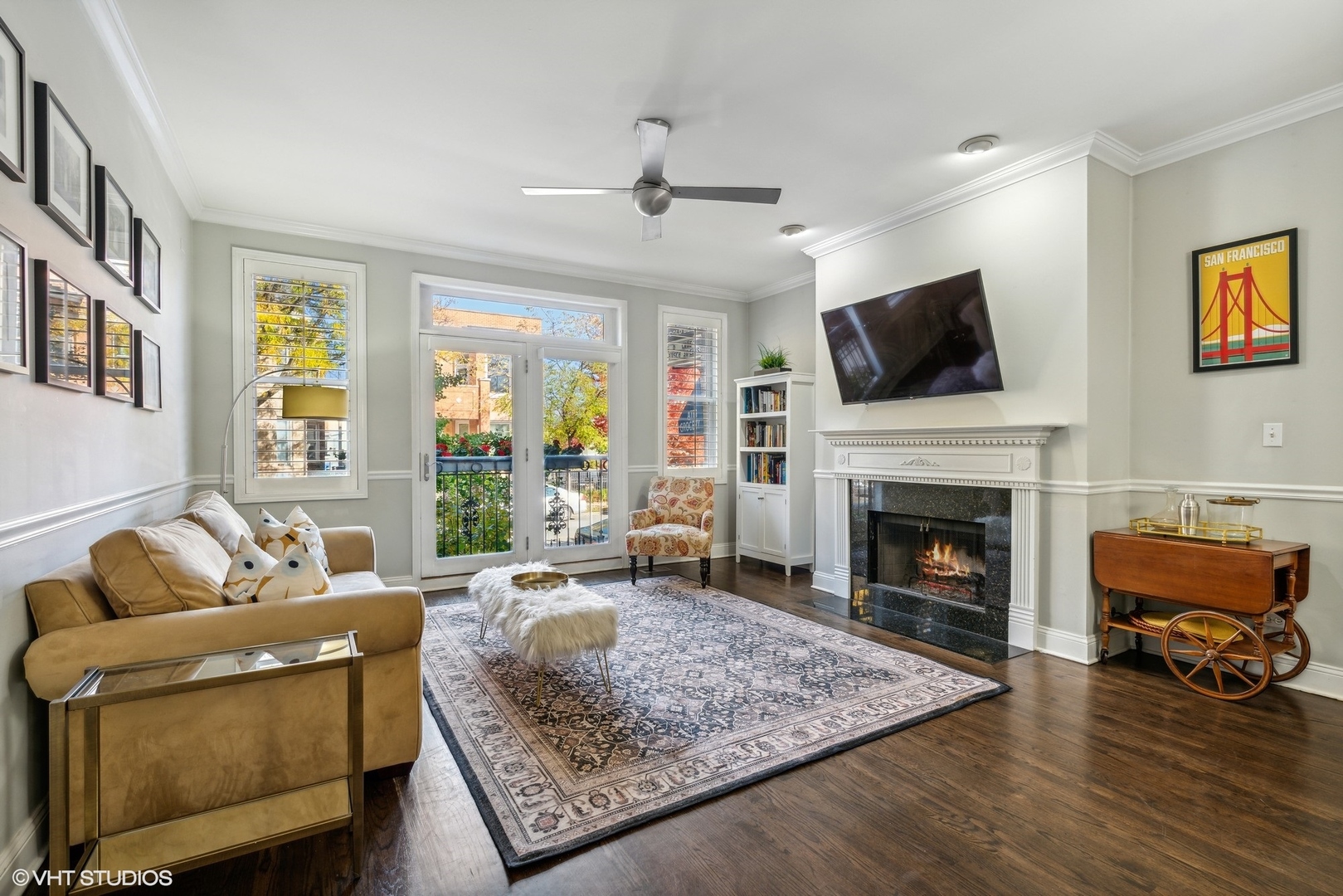 3818 North Clark Street, Unit 1S Chicago, IL 60613 - Photo 2 of 22 a living room with furniture or fireplace and a flat screen tv