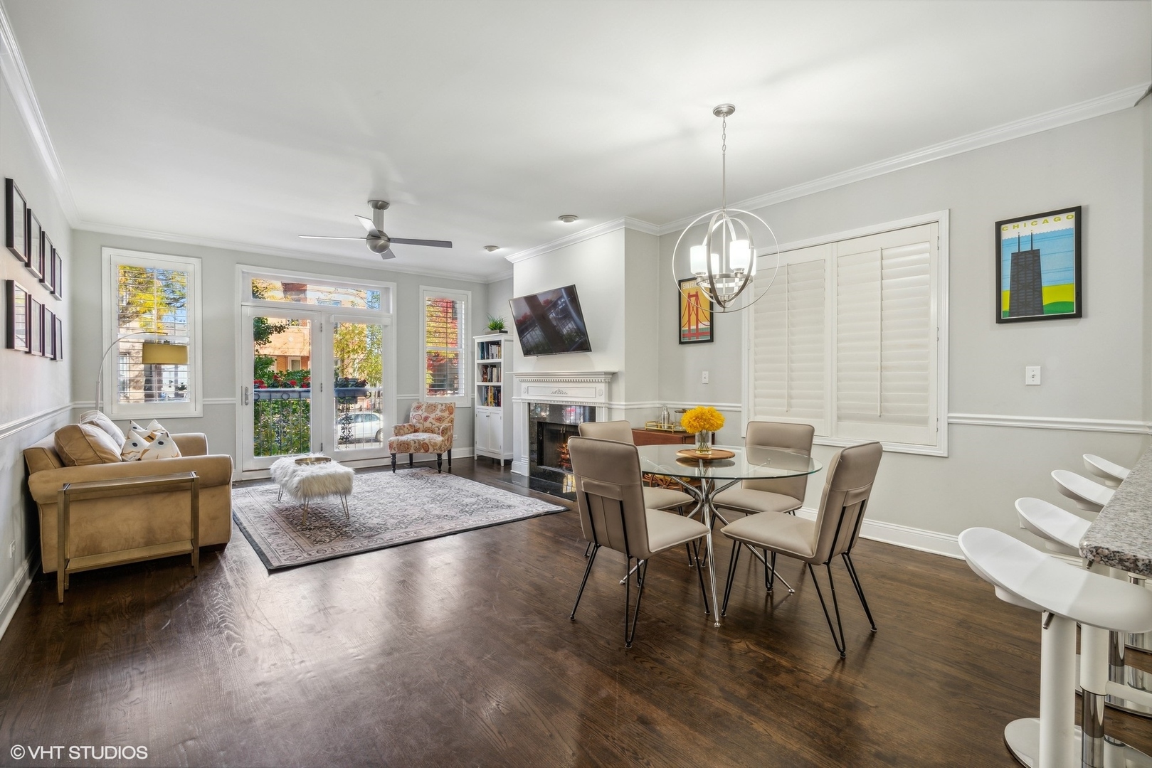 3818 North Clark Street, Unit 1S Chicago, IL 60613 - Photo 8 of 22 a view of a dining room with furniture window and wooden floor