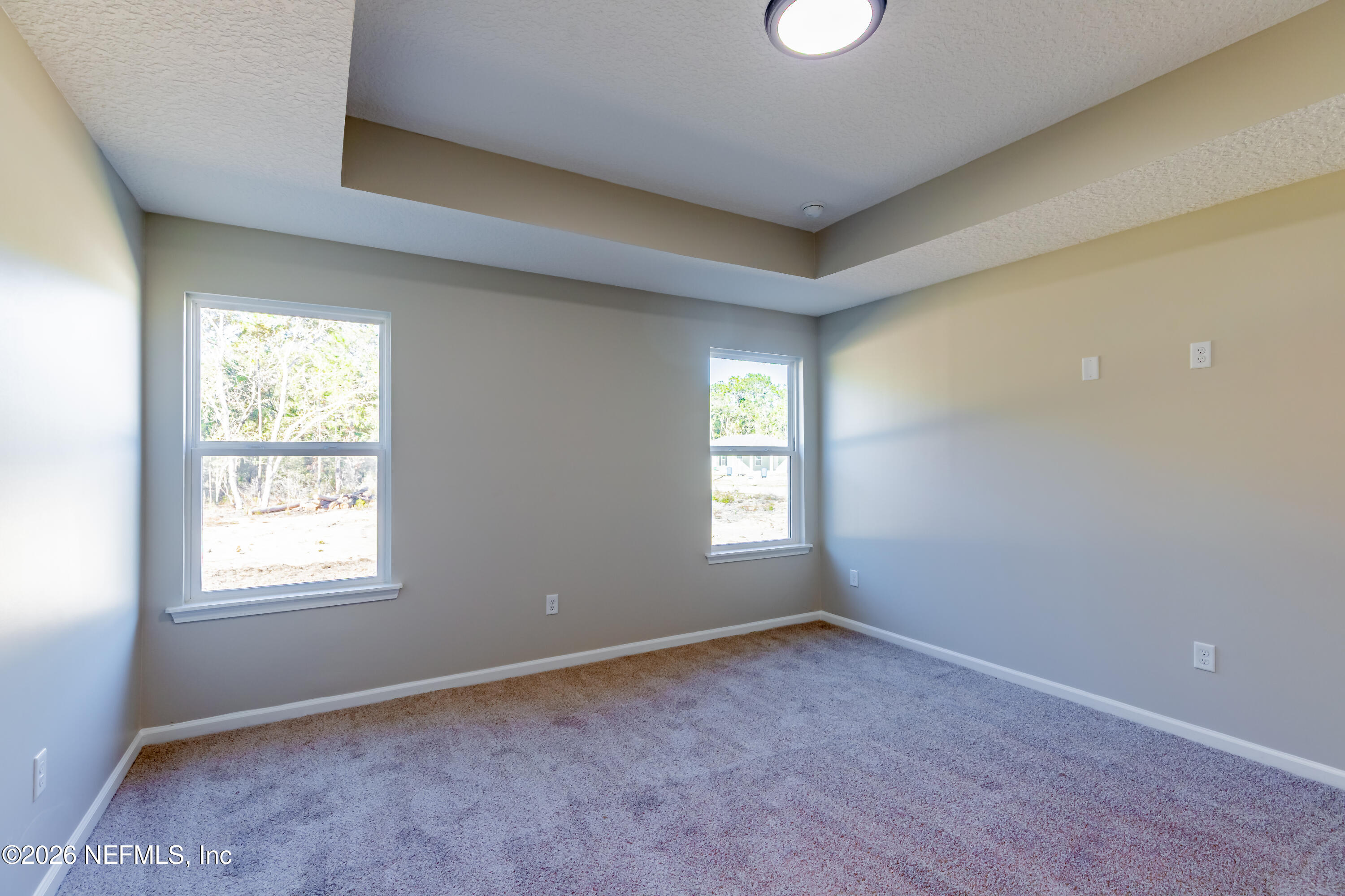 6202 Furman Avenue Keystone Heights, FL 32656 - Photo 12 of 20 an empty room with windows