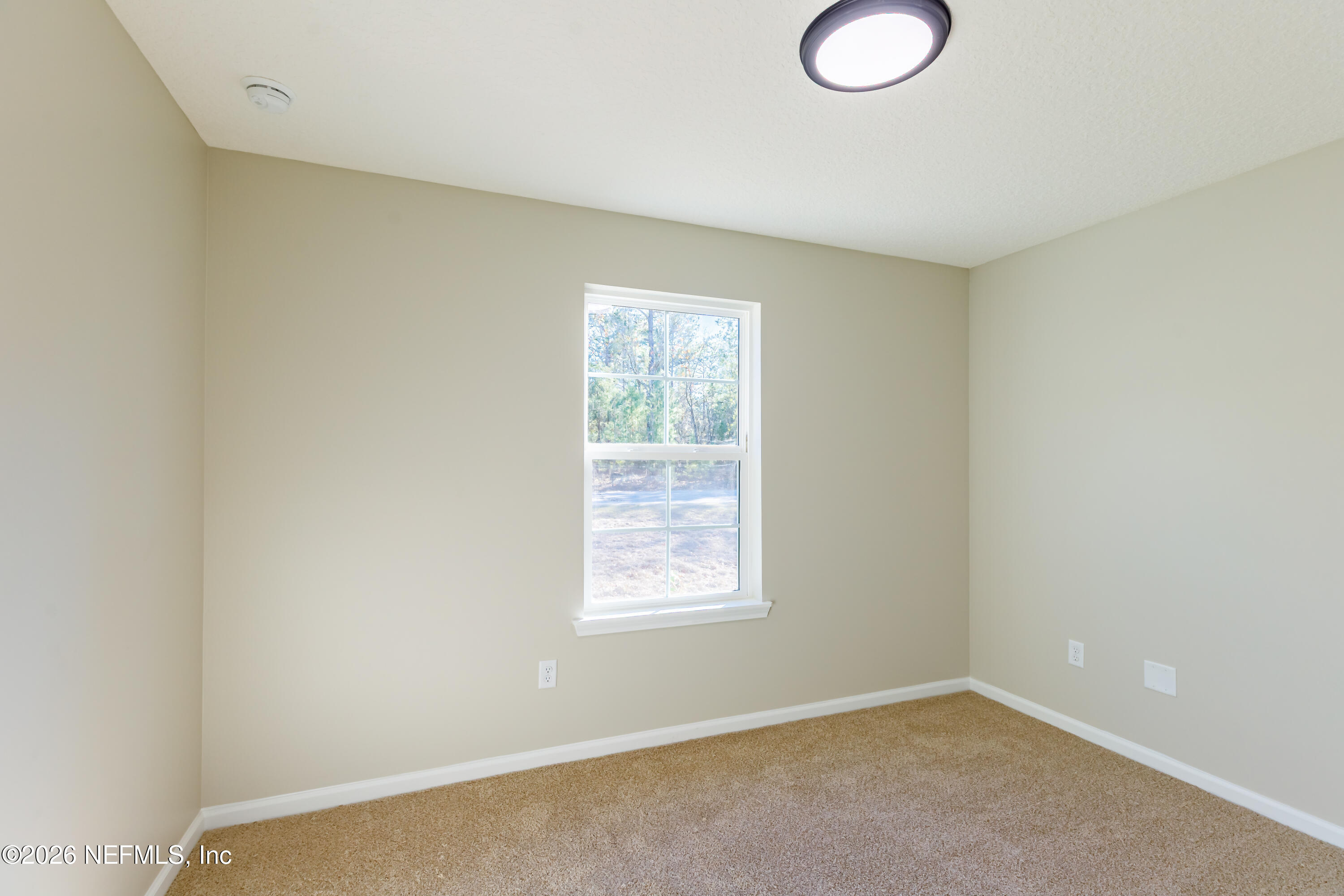 6202 Furman Avenue Keystone Heights, FL 32656 - Photo 15 of 20 an empty room with windows