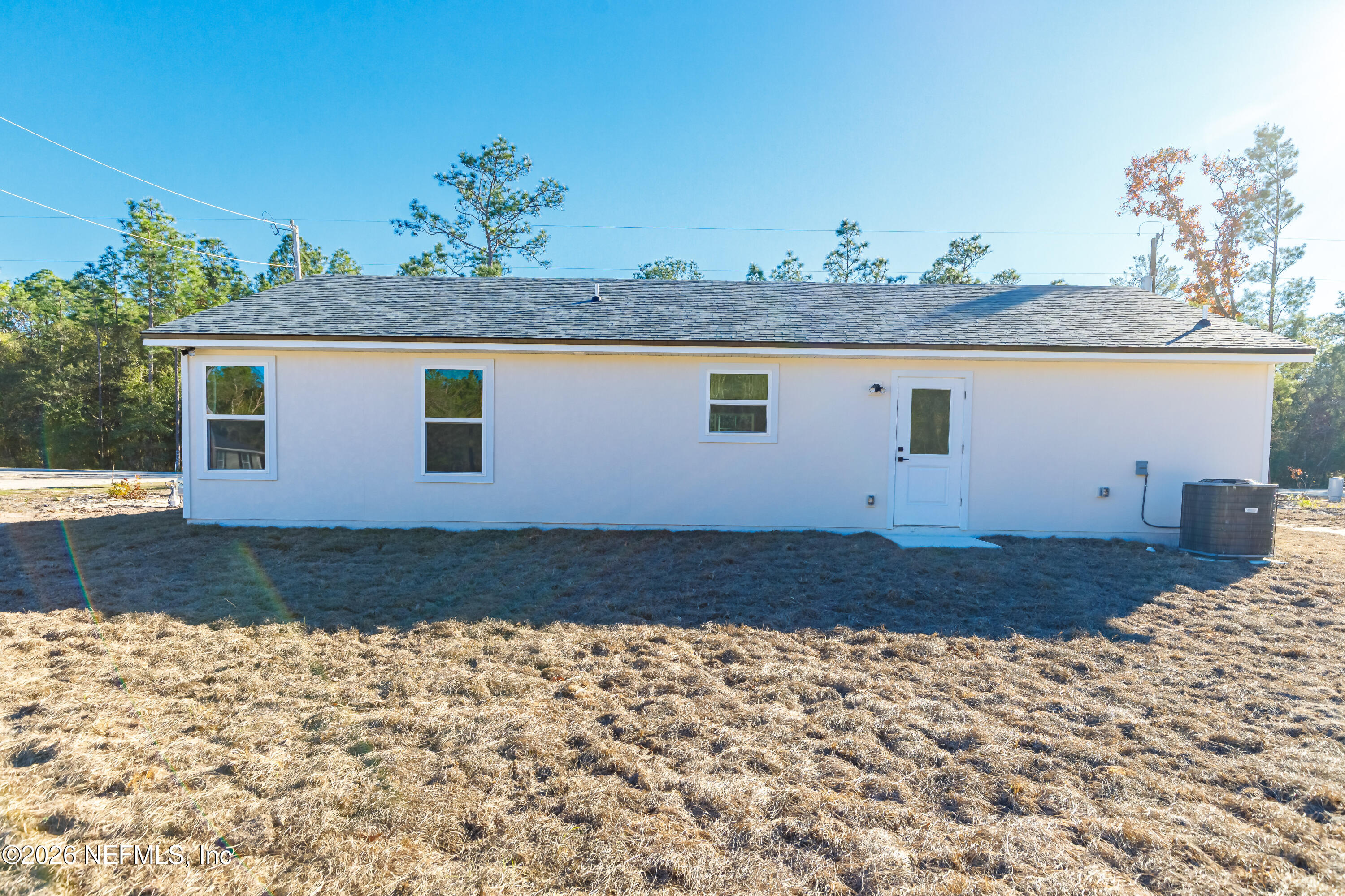 6202 Furman Avenue Keystone Heights, FL 32656 - Photo 23 of 24 a view of a house with a yard