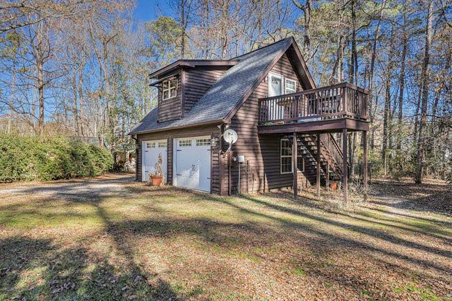240 Oak Grove Road Athens, GA 30607 - Photo 1 of 1 a view of a house with a yard and large tree