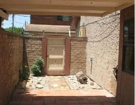 a view of a backyard with a small cabin