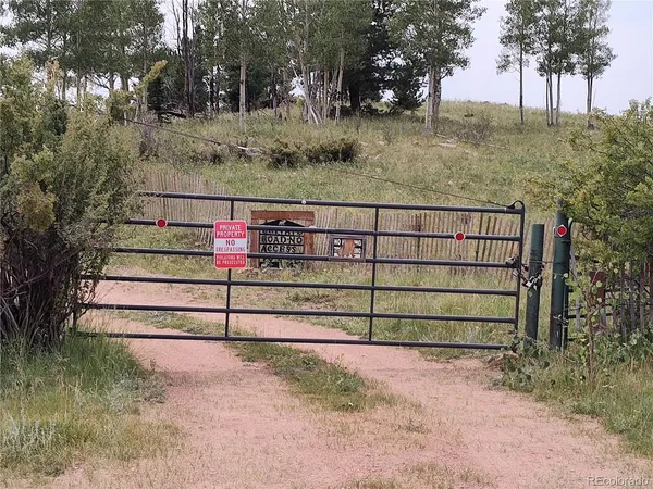 a view of a wooden fence