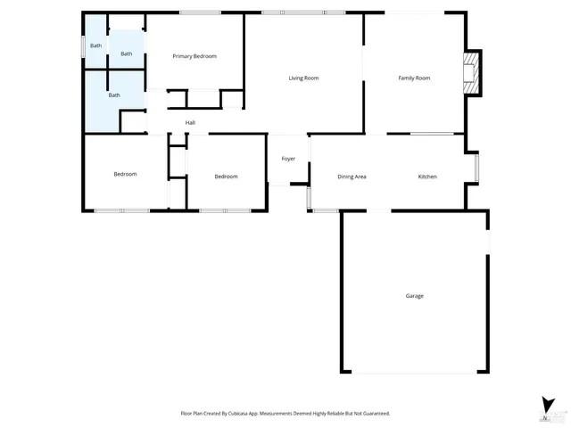 a front view of a house with a yard and outdoor seating