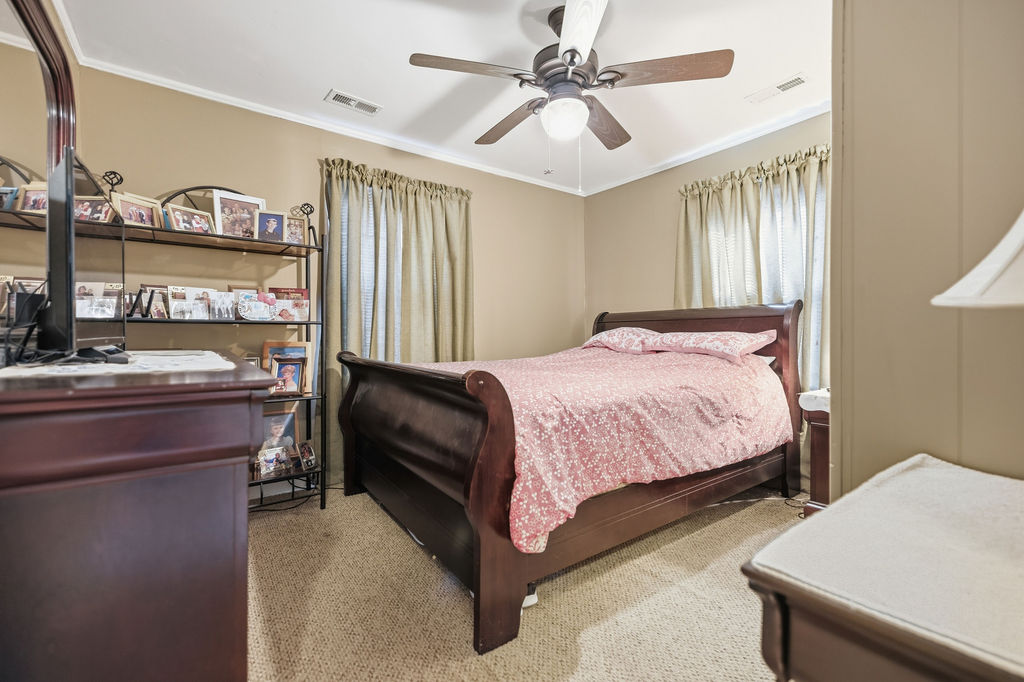 3212 Dixon Road Anderson, SC 29625 - Photo 12 of 23 This cozy bedroom features comfortable flooring, perfect for rest and relaxation.