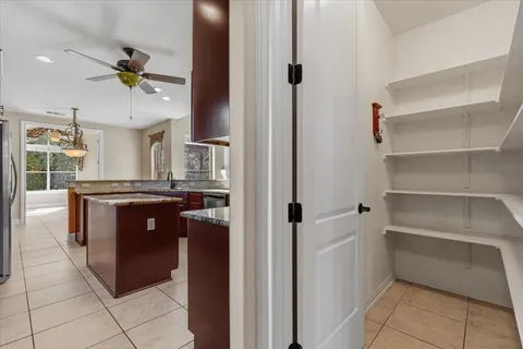 a kitchen with a cabinets and appliances