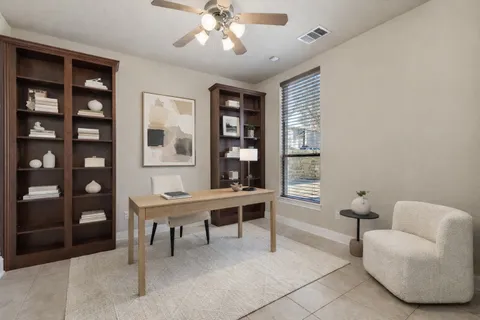 a view of a livingroom with furniture and window
