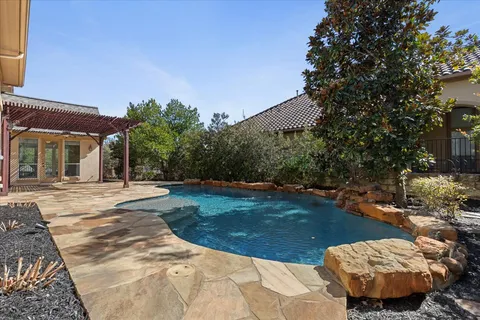 front view of a house with garden